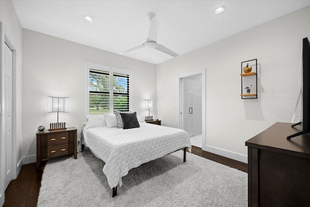 bedroom with baseboards, dark wood-style flooring, and recessed lighting