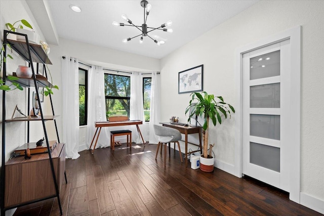 office featuring a chandelier, dark wood finished floors, and baseboards