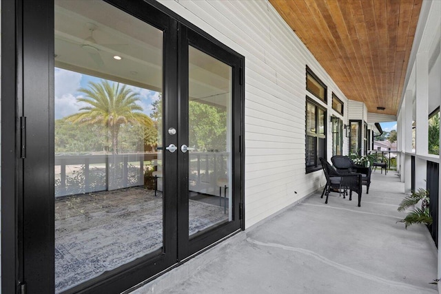 view of patio with a porch and french doors