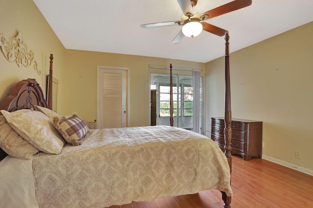 bedroom with ceiling fan, access to outside, and light wood-type flooring