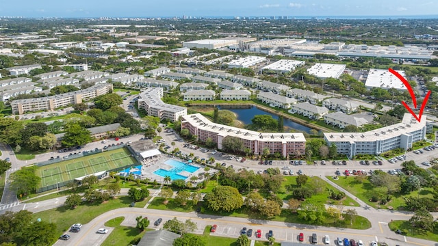 drone / aerial view with a water view