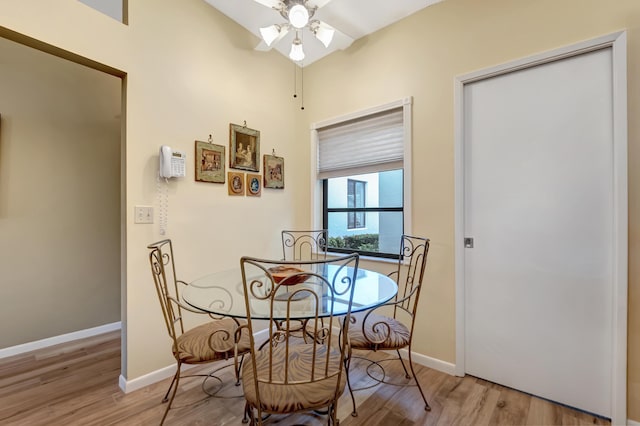 dining area featuring ceiling fan and light hardwood / wood-style flooring