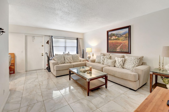 living room with a textured ceiling