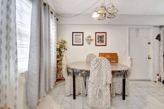 dining area with a chandelier