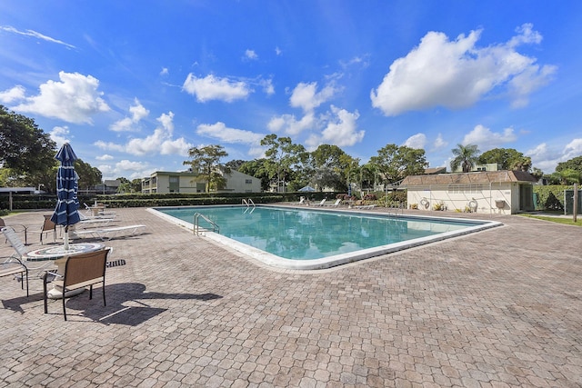 view of pool with a patio