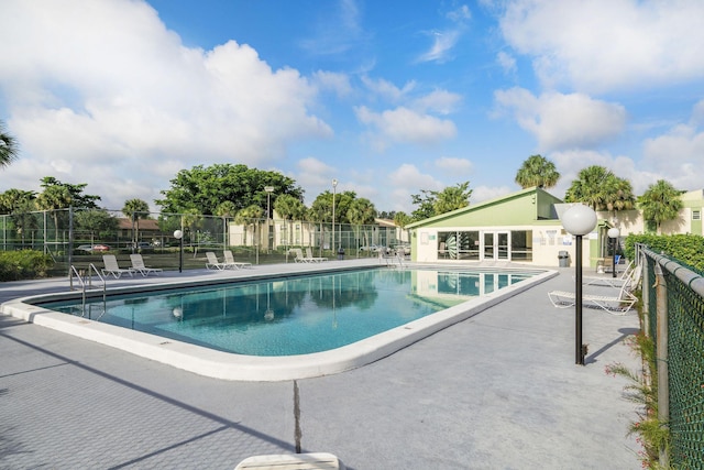 view of swimming pool featuring a patio