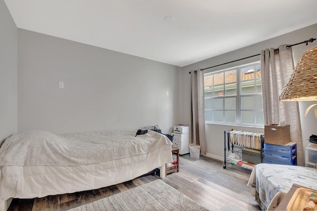 bedroom featuring light hardwood / wood-style floors