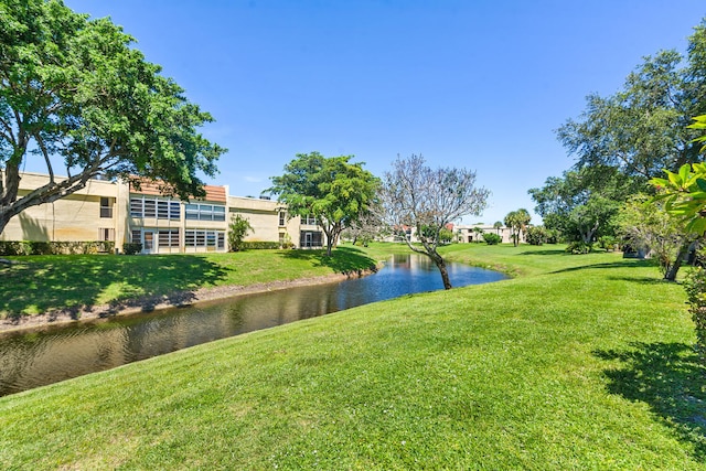 view of yard with a water view