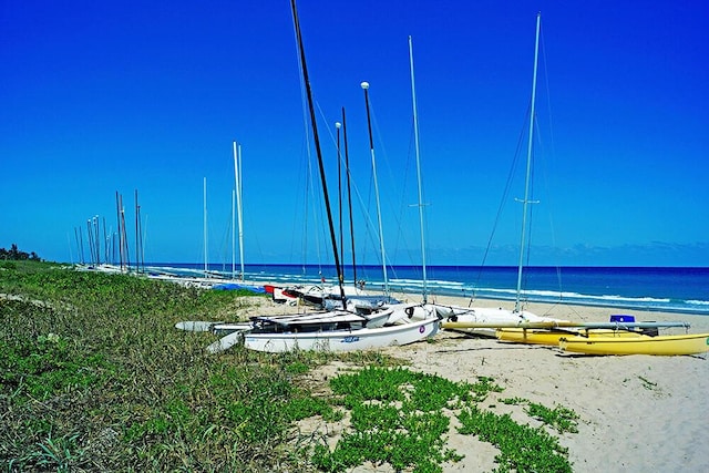 property view of water featuring a beach view