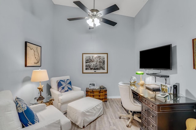 home office with ceiling fan, wood finished floors, and baseboards