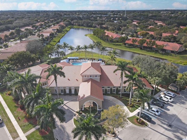 birds eye view of property featuring a water view