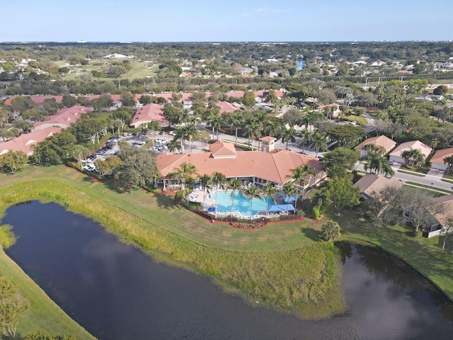 drone / aerial view with a water view and a residential view