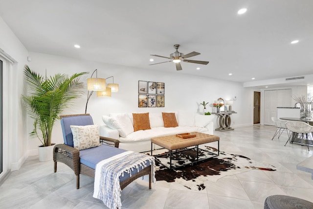 living room with ceiling fan