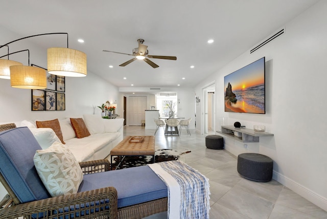 living room featuring ceiling fan