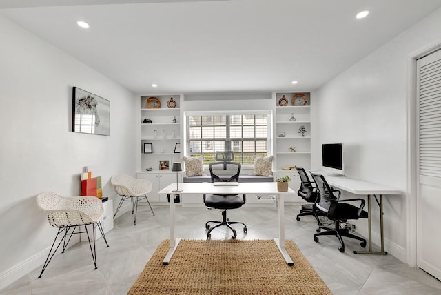 office area featuring built in shelves