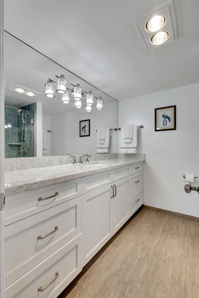 bathroom with vanity and an enclosed shower