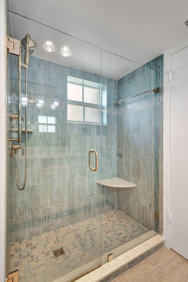 bathroom featuring walk in shower