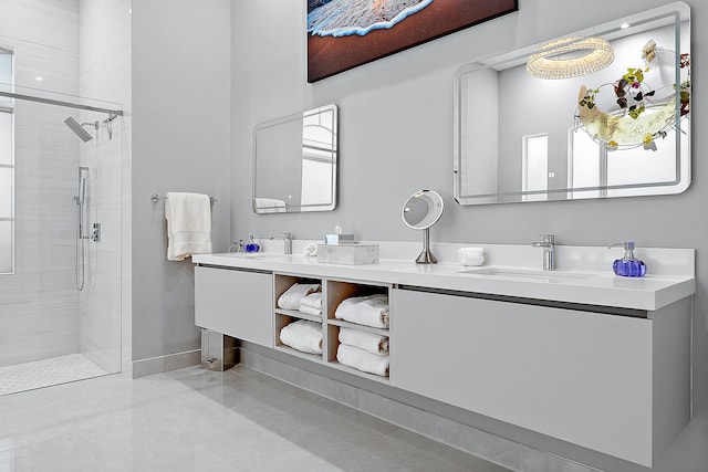 bathroom featuring vanity and an enclosed shower