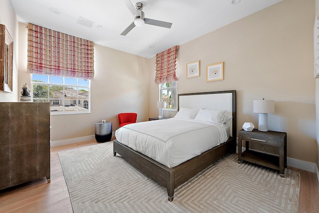 bedroom featuring ceiling fan and light wood-type flooring