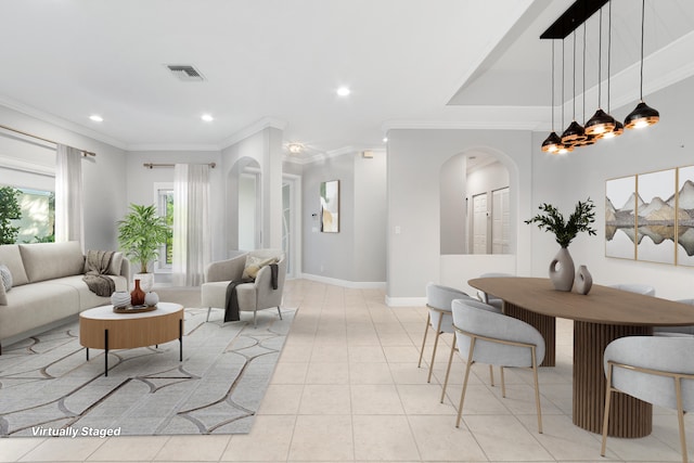 living room with light tile patterned flooring and ornamental molding