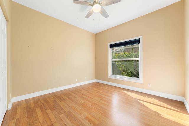 empty room featuring ceiling fan and light wood-type flooring