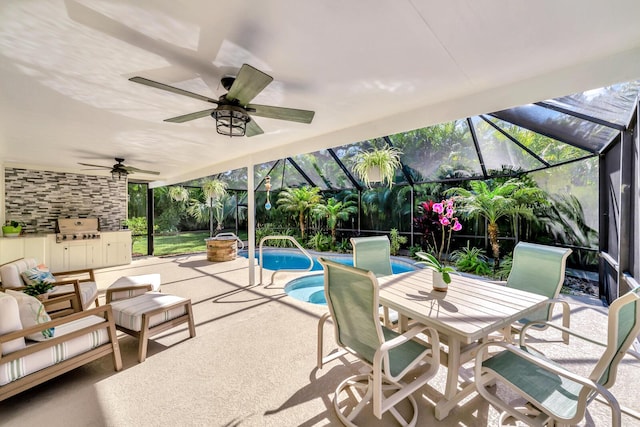 view of patio / terrace featuring an outdoor kitchen, a grill, ceiling fan, a lanai, and an outdoor pool