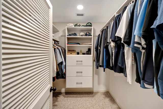 walk in closet with visible vents