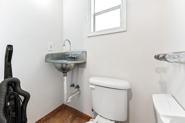 bathroom featuring toilet