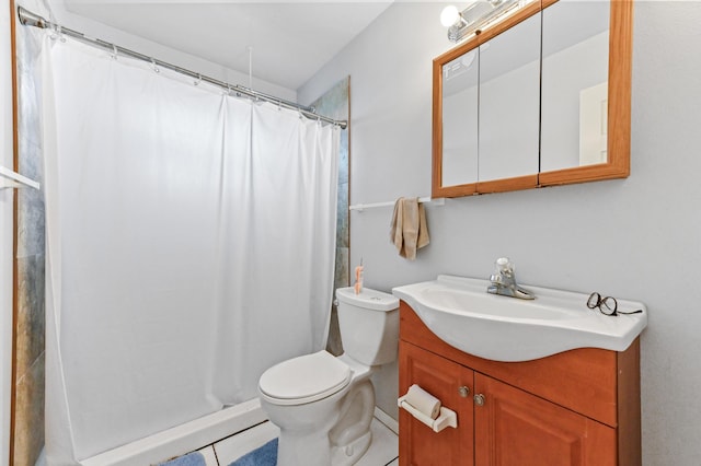 bathroom with vanity, curtained shower, and toilet