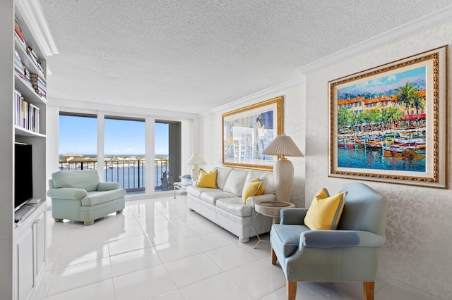 tiled living room featuring crown molding, a textured ceiling, and a water view