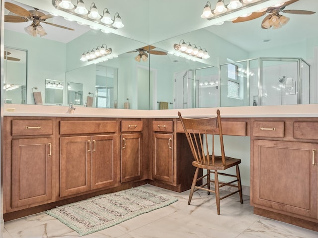 bathroom featuring a stall shower, marble finish floor, and ceiling fan