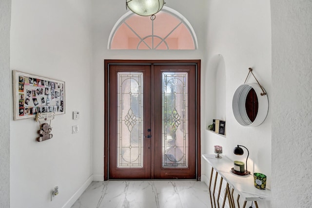 entrance foyer featuring french doors