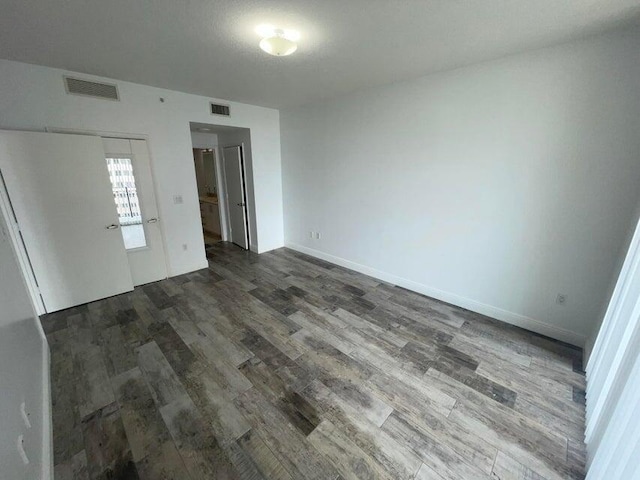 interior space with dark wood-type flooring