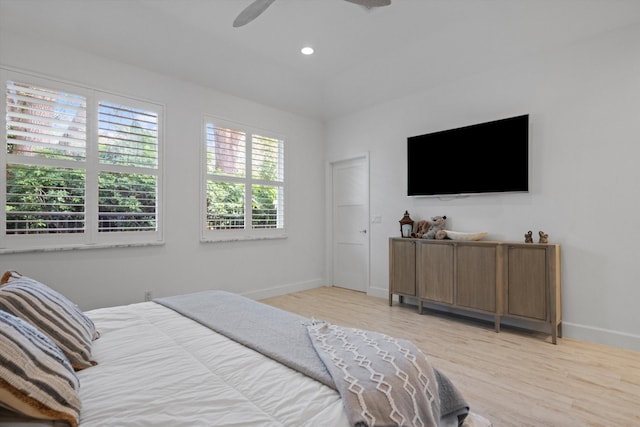 bedroom featuring ceiling fan, recessed lighting, light wood-type flooring, and baseboards