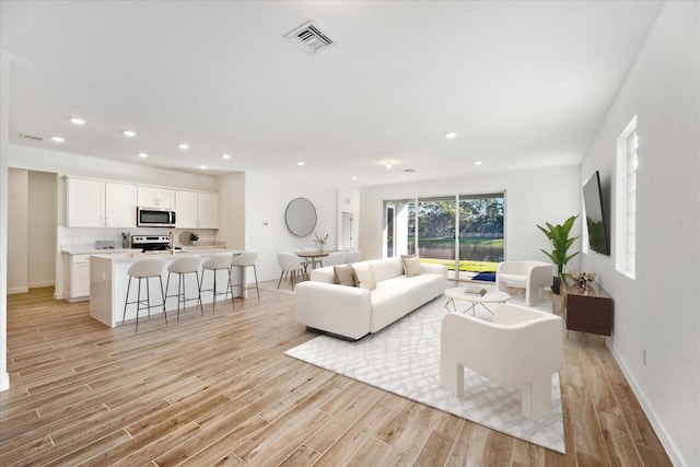 living room featuring light hardwood / wood-style flooring