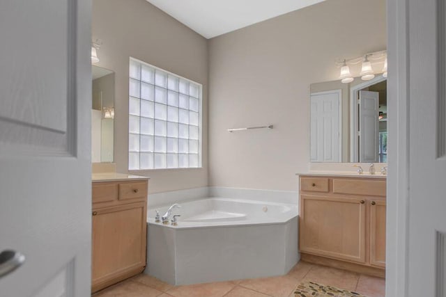6731 Southport Dr W, Boynton Beach, FL 33472 - full bathroom with tile patterned flooring, a sink, two vanities, and a garden tub