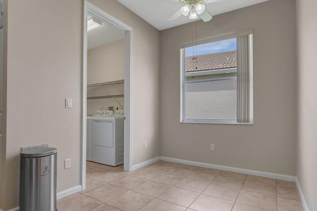 6731 Southport Dr W, Boynton Beach, FL 33472 - unfurnished room with a ceiling fan, light tile patterned floors, baseboards, and separate washer and dryer