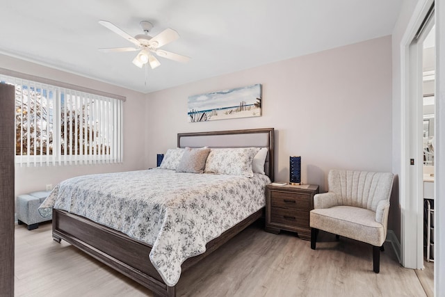 bedroom featuring wood-type flooring and ceiling fan