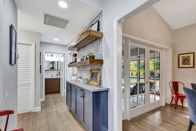 kitchen featuring light hardwood / wood-style floors and french doors