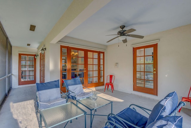 living room with french doors and ceiling fan