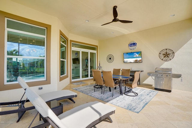 view of patio / terrace with a grill and ceiling fan