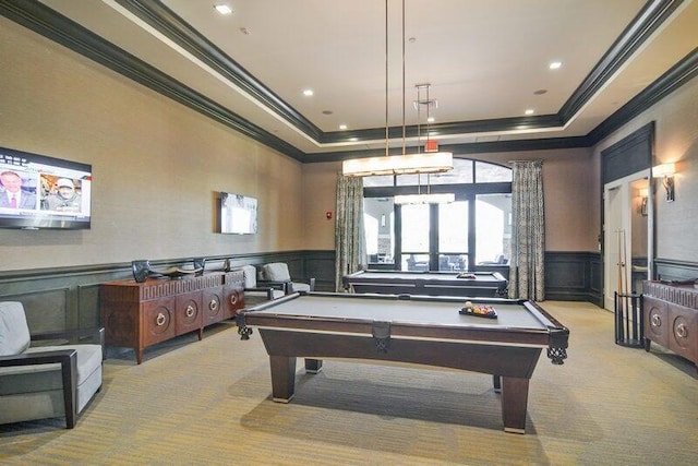 rec room with crown molding, billiards, a tray ceiling, and light carpet