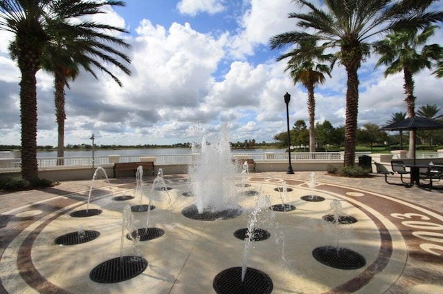 view of home's community featuring a water view