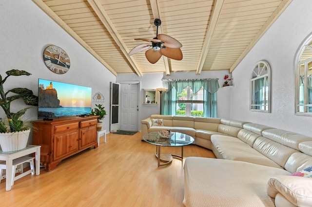 living room with vaulted ceiling with beams, wooden ceiling, ceiling fan, and light wood-type flooring