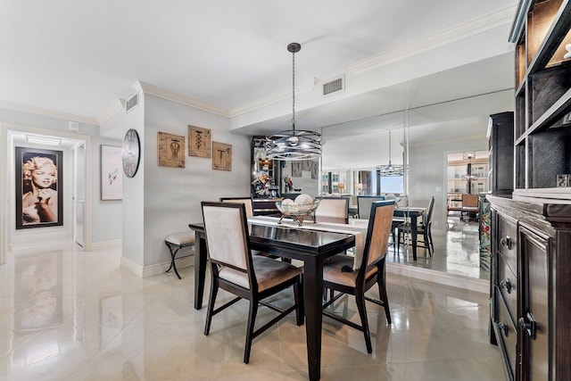 dining room with crown molding