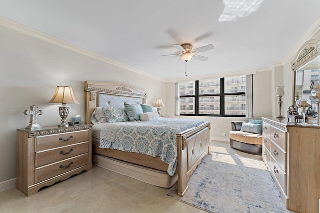 bedroom with ornamental molding and ceiling fan