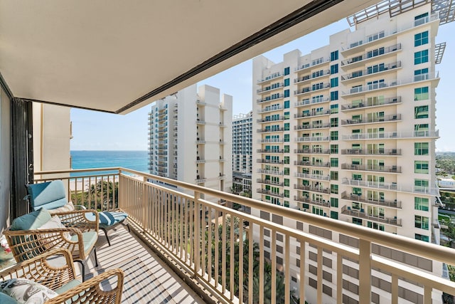 balcony featuring a water view