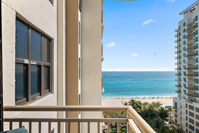 property view of water featuring a beach view