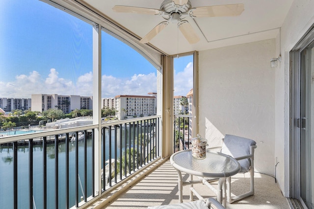 2871 N Ocean Blvd Unit F427, Boca Raton, FL 33431 - balcony featuring ceiling fan and a water view