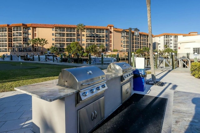 2871 N Ocean Blvd Unit F427, Boca Raton, FL 33431 - view of patio / terrace featuring grilling area and an outdoor kitchen